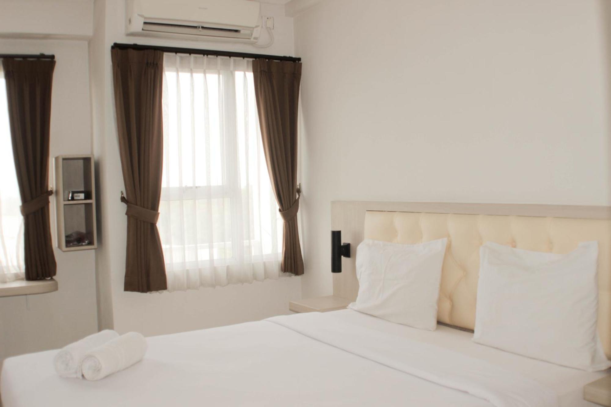 Homey And Cozy At Elvis Tower By Travelio Apartemen
